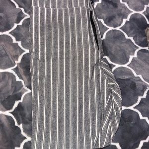 grey with white striped pants.